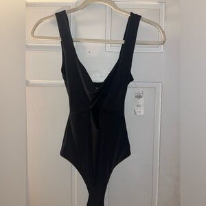 Women’s, Abercrombie & Fitch bodysuit. Center cutout. Black. With tags. Size: XS